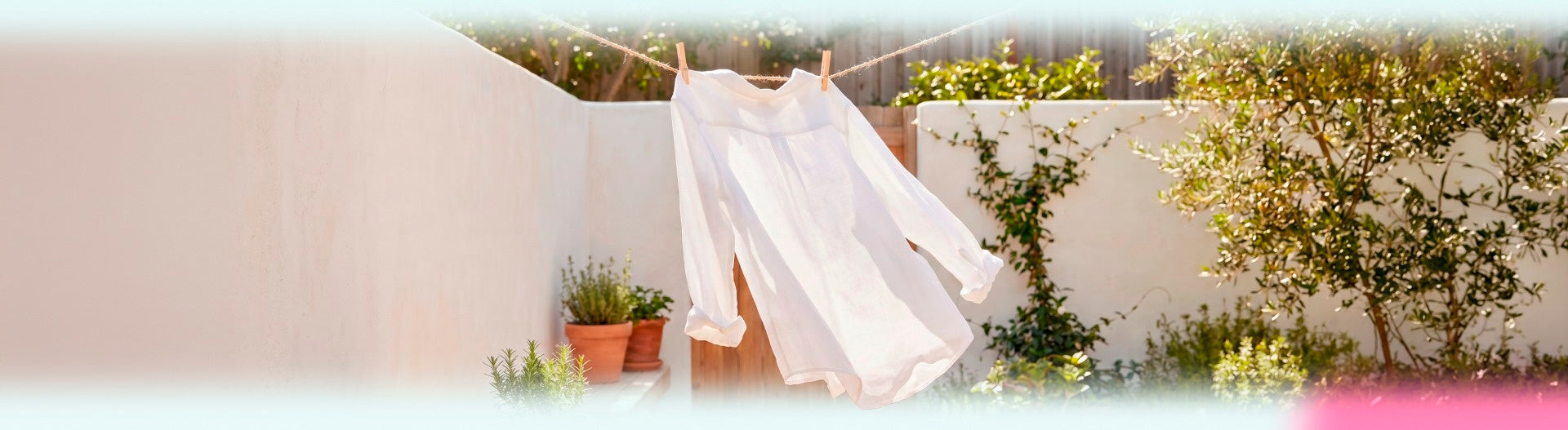 Fresh laundry drying in a sunlit garden
